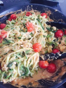 Mix the courgetti with the crab sauce Laura of London